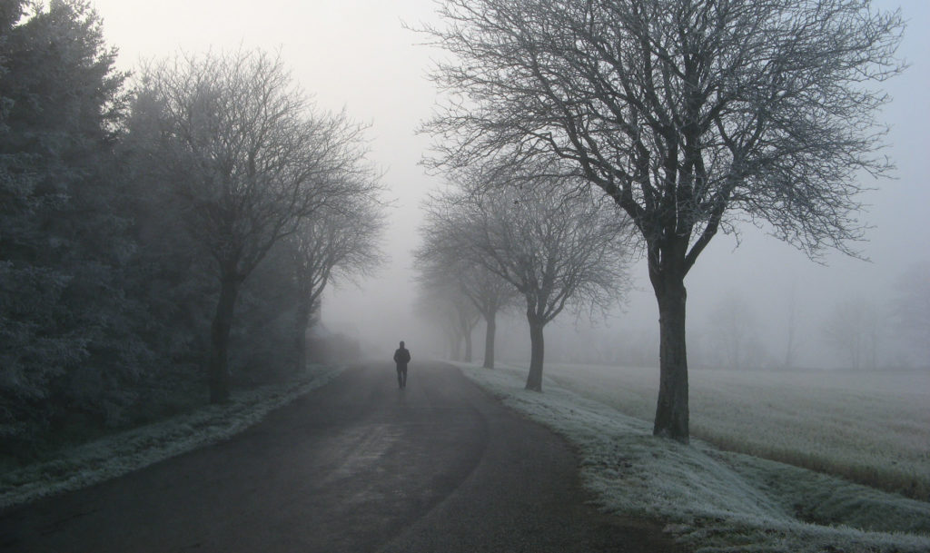 I don't belong walking down a foggy road